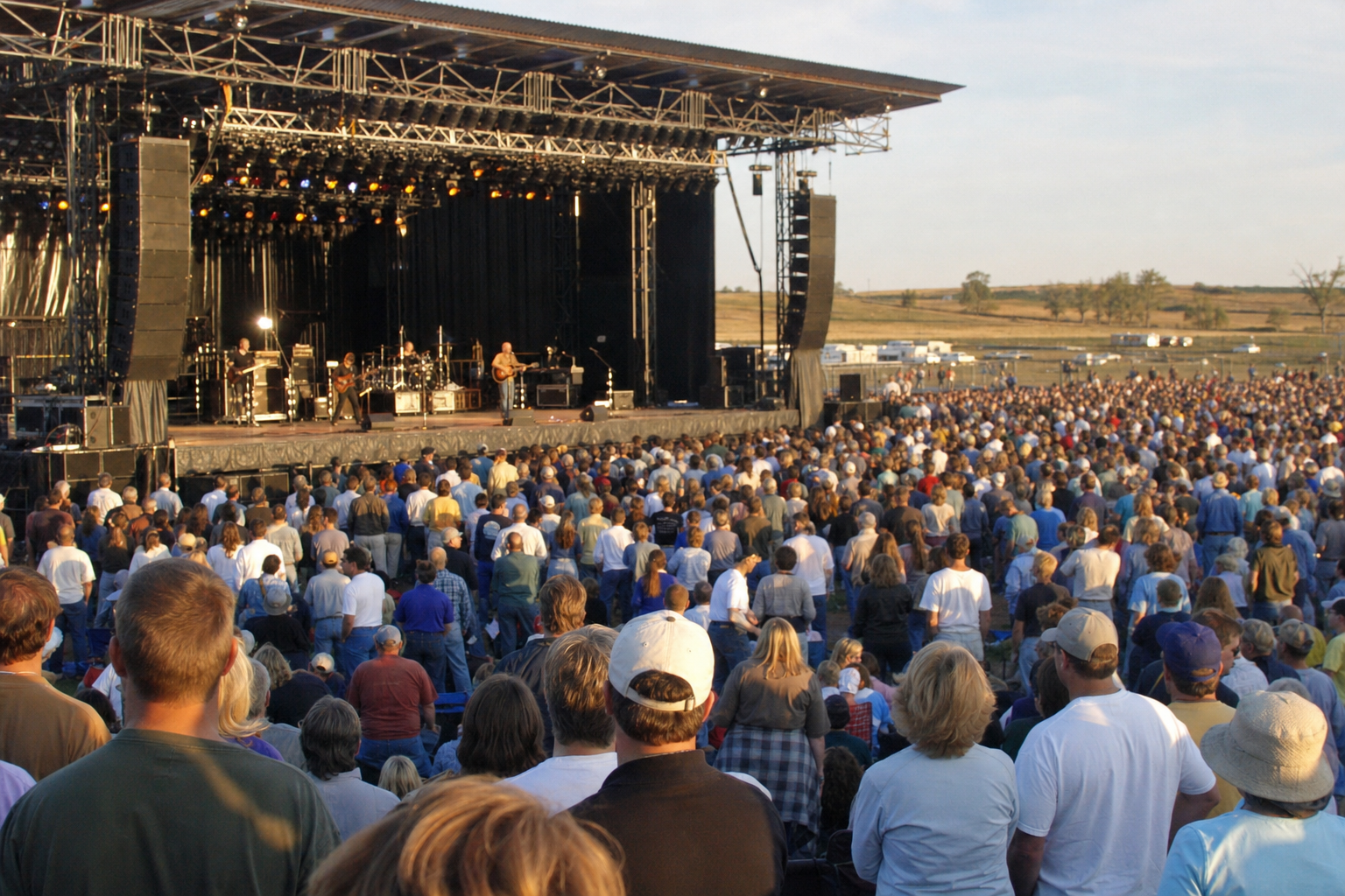 Artist recreation of Brad Nietfeldt performing at Harvest Festival in Comstock, Nebraska